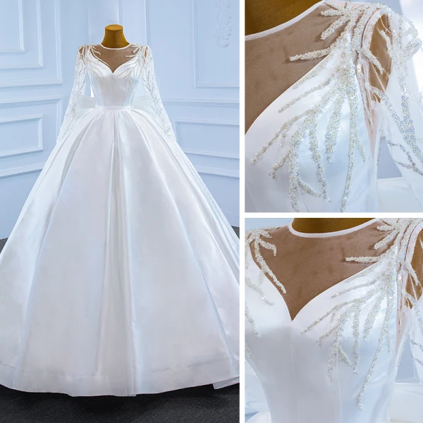 Luxe Blanche Satin La Mariée Robe De Mariée 2021 Robe Boule Transparentes Encolure Dégagée Manches Longues Dos Nu Perlage Paillettes Noeud Ceinture Tribunal Train