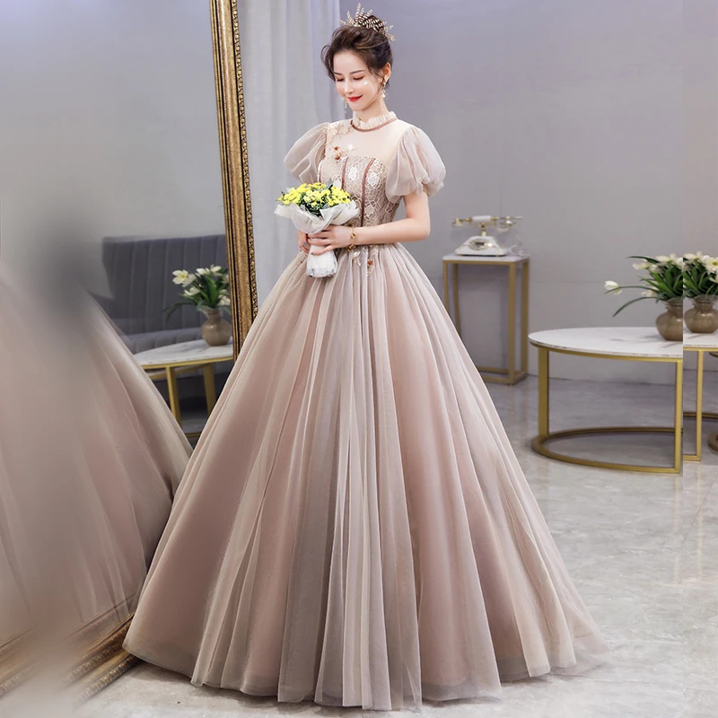 Vintage Retro Tan Dancing Prom Dresses 2021 Ball Gown See Through High Neck  Puffy Short Sleeve Appliques Lace Beading Floor Length Long Ruffle