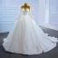Charmant Blanche La Mariée Robe De Mariée 2021 Robe Boule Transparentes Encolure Dégagée Manches Longues Dos Nu Appliques En Dentelle Fait main Perlage Glitter Tulle