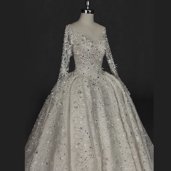 Illusion Ivory Wedding Dresses 2018 Ball Gown V-Neck Long Sleeve Backless Star Appliques Pierced Lace Glitter Rhinestone Cathedral Train Ruffle