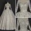Illusion Ivory Wedding Dresses 2018 Ball Gown V-Neck Long Sleeve Backless Star Appliques Pierced Lace Glitter Rhinestone Cathedral Train Ruffle