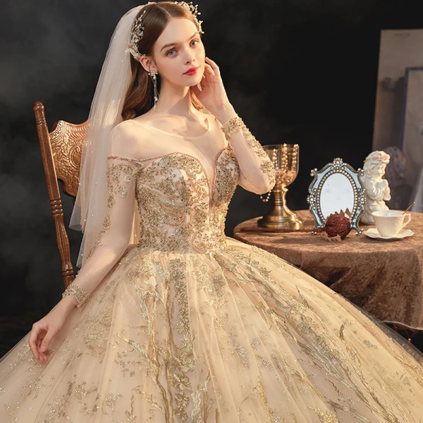 High-end Champagne Bridal Wedding Dresses 2021 Ball Gown See-through Scoop Neck Long Sleeve Backless Appliques Lace Beading Glitter Tulle Cathedral Train Ruffle