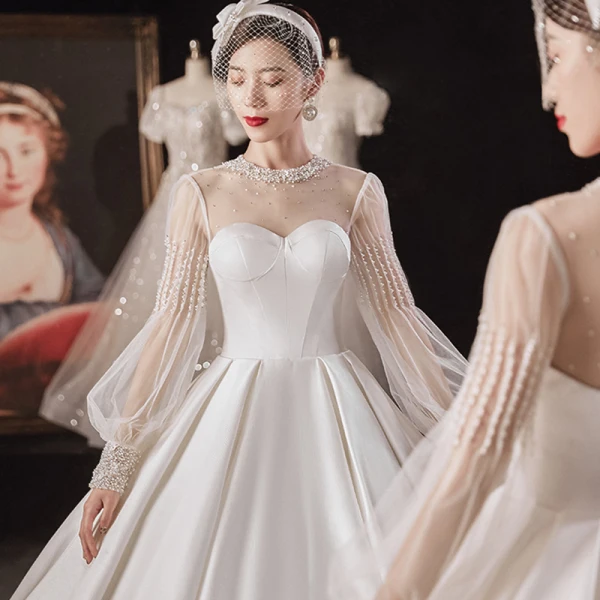 Victorian Style Ivory See-through Bridal Wedding Dresses 2021 Ball Gown High Neck Puffy Long Sleeve Backless Beading Pearl Rhinestone Cathedral Train Ruffle