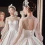 Victorian Style Ivory See-through Bridal Wedding Dresses 2021 Ball Gown High Neck Puffy Long Sleeve Backless Beading Pearl Rhinestone Cathedral Train Ruffle