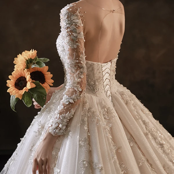 Charming Champagne Handmade  Bridal Wedding Dresses 2021 Ball Gown See-through Scoop Neck Long Sleeve Backless Appliques Lace Beading Glitter Tulle Cathedral Train Ruffle