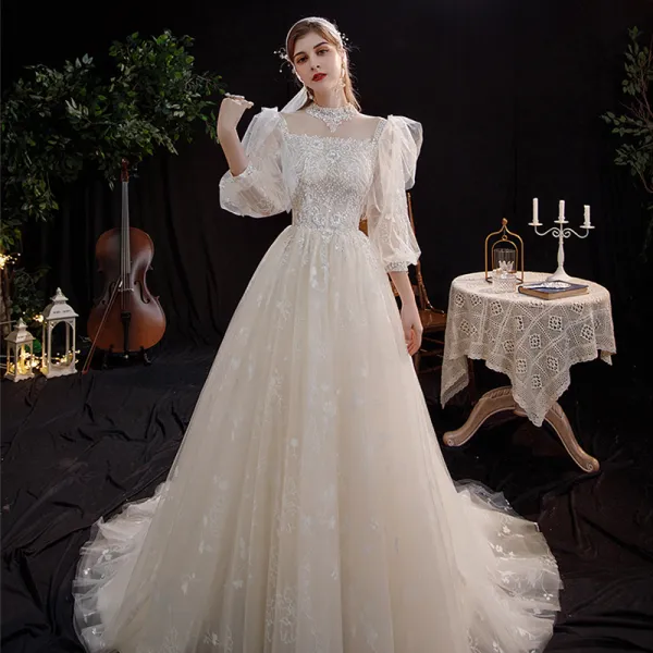 Victorian Style Champagne Outdoor / Garden Wedding Dresses 2021 A-Line / Princess See-through High Neck Puffy 3/4 Sleeve Backless Appliques Lace Sequins Sweep Train Ruffle