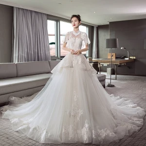 Style Chinois Ivoire Transparentes Robe De Mariée 2018 Princesse Col Haut Manches Courtes Dos Nu Appliques En Dentelle Perlage Cathedral Train Volants