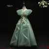 Wróżka Kwiatowa Zielony Urodziny Sukienki Dla Dziewczynek 2021 Suknia Balowa V-Szyja Bez Rękawów Bez Pleców Aplikacje Z Koronki Kwiat Frezowanie Długie Wzburzyć