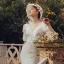 Haut de Gamme Jardin / Extérieur Blanche Dentelle Robe De Mariée 2021 Trompette / Sirène Col v profond Gonflée Manches Courtes Dos Nu Train De Balayage Volants