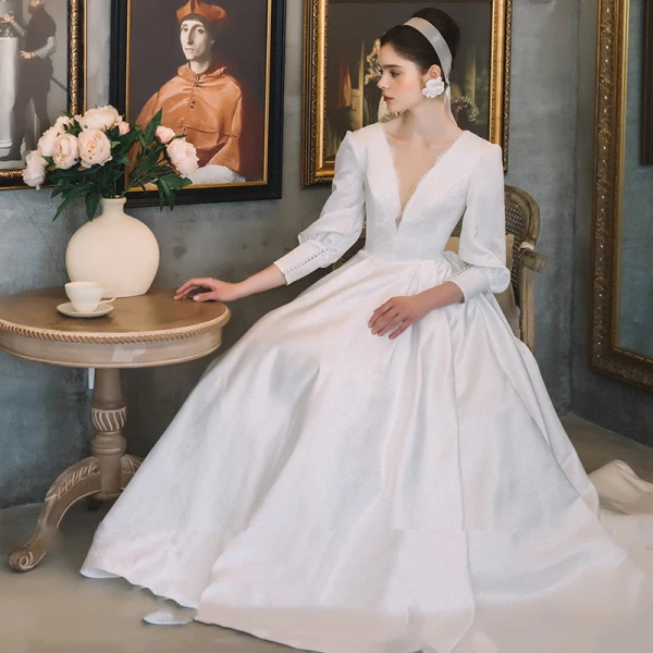 Vintage / Retro White Satin Bridal Wedding Dresses 2021 A-Line / Princess See-through Deep V-Neck Puffy 3/4 Sleeve Backless Court Train Ruffle