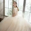Romantique Champagne La Mariée Robe De Mariée 2021 Robe Boule Transparentes Encolure Dégagée Gonflée Manches Courtes Dos Nu Appliques En Dentelle Perlage Paillettes Glitter Tulle Cathedral Train Volants