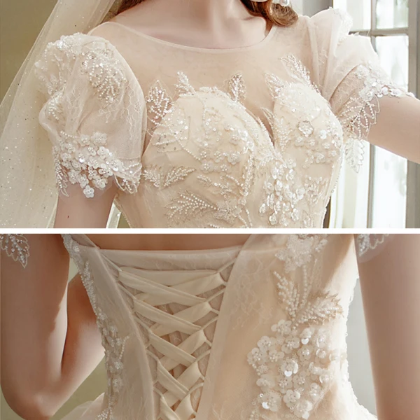 Romantique Champagne La Mariée Robe De Mariée 2021 Robe Boule Transparentes Encolure Dégagée Gonflée Manches Courtes Dos Nu Appliques En Dentelle Perlage Paillettes Glitter Tulle Cathedral Train Volants
