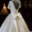 Abordable Ivoire Satin La Mariée Robe De Mariée 2021 Robe Boule Encolure Carrée Manches Courtes Dos Nu Perlage Perle Noeud Longue Volants