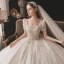 Classique Champagne La Mariée Robe De Mariée 2021 Robe Boule Encolure Carrée Gonflée Manches Courtes Dos Nu Noeud Perlage Paillettes Glitter Tulle Cathedral Train Volants