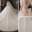 Classique Champagne La Mariée Robe De Mariée 2021 Robe Boule Encolure Carrée Gonflée Manches Courtes Dos Nu Noeud Perlage Paillettes Glitter Tulle Cathedral Train Volants