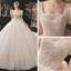 Classique Champagne La Mariée Robe De Mariée 2021 Robe Boule Encolure Carrée Gonflée Manches Courtes Dos Nu Noeud Perlage Paillettes Glitter Tulle Cathedral Train Volants