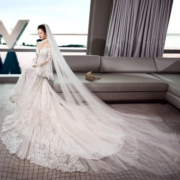 Luxe Ivoire Transparentes Robe De Mariée 2018 Trompette / Sirène De l'épaule Manches de cloche Dos Nu Appliques En Dentelle Glitter Tulle Chapel Train Volants