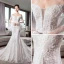 Luxe Ivoire Transparentes Robe De Mariée 2018 Trompette / Sirène De l'épaule Manches de cloche Dos Nu Appliques En Dentelle Glitter Tulle Chapel Train Volants