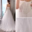 Élégant Blanche Robe De Mariée 2018 Princesse Bustier Sans Manches Dos Nu Plumes Perlage Train De Balayage Volants
