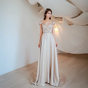 Meilleur Champagne Robe De Bal 2021 Princesse V Cou Manches Courtes Perlage Ceinture Train De Balayage Volants Dos Nu Robe De Ceremonie