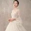 Chic / Belle Champagne Transparentes Robe De Mariée 2018 Robe Boule Encolure Dégagée Manches de cloche Dos Nu Papillon Appliques En Dentelle Fait main Perlage Faux Diamant Cathedral Train Volants