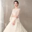 Chic / Belle Champagne Transparentes Robe De Mariée 2018 Robe Boule Encolure Dégagée Manches de cloche Dos Nu Papillon Appliques En Dentelle Fait main Perlage Faux Diamant Cathedral Train Volants