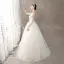 Illusion Ivory / Creme Durchsichtige Brautkleider / Hochzeitskleider 2018 A Linie Rundhalsausschnitt Lange Ärmel Rückenfreies Applikationen Spitze Sweep / Pinsel Zug Rüschen