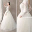 Illusion Ivory / Creme Durchsichtige Brautkleider / Hochzeitskleider 2018 A Linie Rundhalsausschnitt Lange Ärmel Rückenfreies Applikationen Spitze Sweep / Pinsel Zug Rüschen