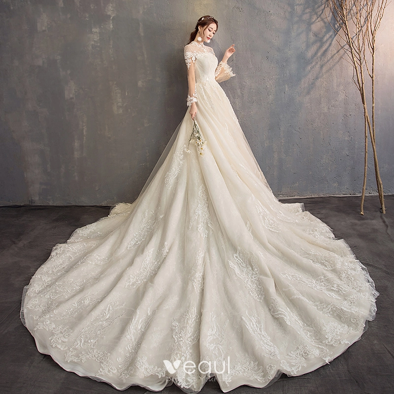 Modern Fashion Champagne See through Wedding Dresses 2019 A Line Princess High Neck Long Sleeve Backless Appliques Lace Beading Glitter Tulle Cathedral Train Ruffle