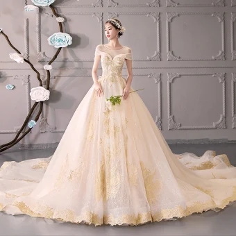 Luxe Champagne Transparentes Robe De Mariée 2019 Robe Boule Encolure Dégagée Manches Courtes Dos Nu Doré Appliques En Dentelle Perlage Glitter Tulle Cathedral Train Volants