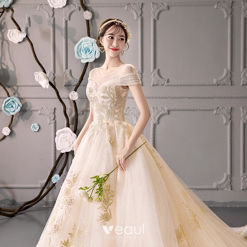 Luxury / Gorgeous Champagne See-through Wedding Dresses 2019 Ball Gown  Scoop Neck Short Sleeve Backless Gold Appliques Lace Beading Glitter Tulle  Cathedral Train Ruffle