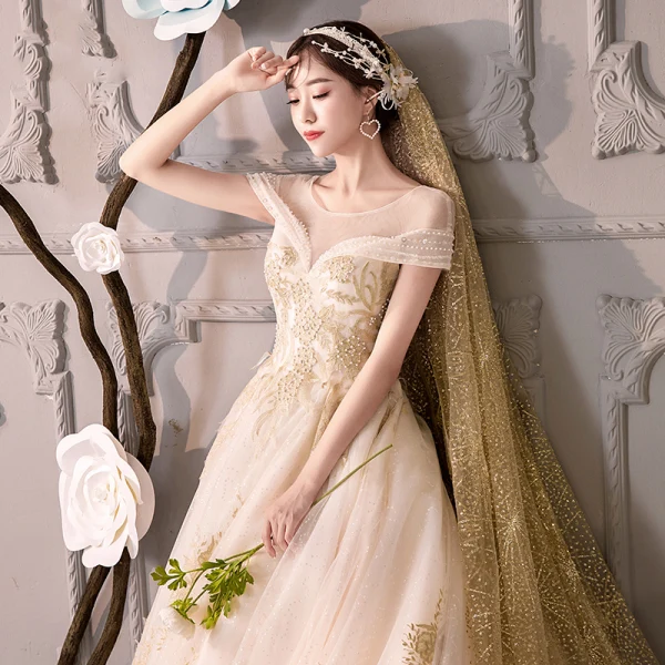 Luxury / Gorgeous Champagne See-through Wedding Dresses 2019 Ball Gown Scoop Neck Short Sleeve Backless Gold Appliques Lace Beading Glitter Tulle Cathedral Train Ruffle