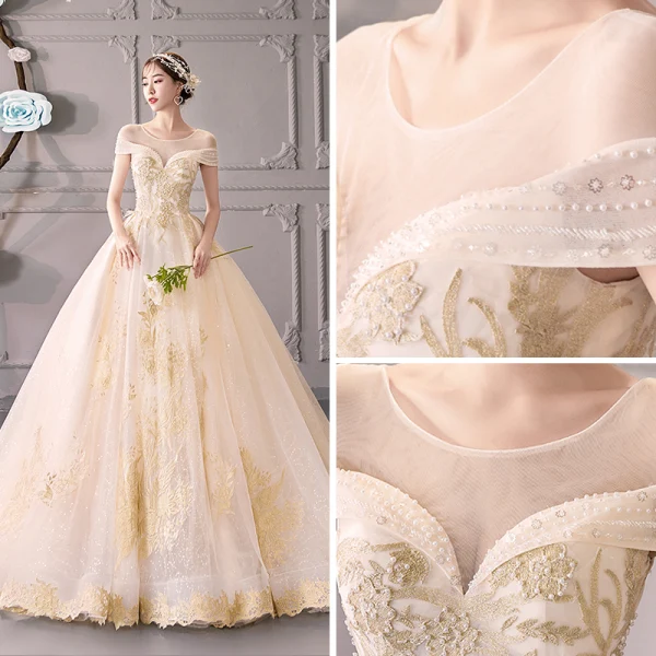 Luxury / Gorgeous Champagne See-through Wedding Dresses 2019 Ball Gown Scoop Neck Short Sleeve Backless Gold Appliques Lace Beading Glitter Tulle Cathedral Train Ruffle