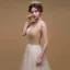 Romantique Champagne Daim Robe De Bal 2019 Princesse Appliques En Dentelle épaules Sans Manches Longue Volants Dos Nu Robe De Ceremonie