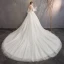 Vintage / Originale Ivoire Transparentes Robe De Mariée 2019 Robe Boule Col Haut Gonflée Manches Longues Dos Nu Appliques En Dentelle Cathedral Train Volants