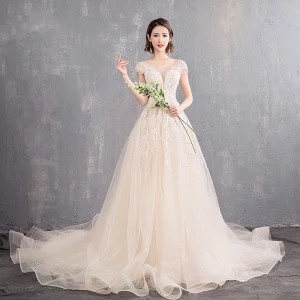 Élégant Champagne Transparentes Robe De Mariée 2019 Princesse Encolure Dégagée Mancherons Dos Nu Appliques En Dentelle Perlage Perle Chapel Train Volants