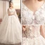 Charmant Ivoire Transparentes Robe De Mariée 2019 Robe Boule V-Cou Sans Manches Dos Nu Appliques En Dentelle Fleur Perle Perlage Watteau Train Volants