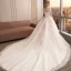 Colored Ivory See-through Wedding Dresses 2019 Ball Gown Scoop Neck Long Sleeve Backless Appliques Lace Pearl Cathedral Train Ruffle
