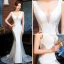 Sexy Ivoire Transparentes Robe De Soirée 2019 Trompette / Sirène V-Cou Sans Manches Faux Diamant Tribunal Train Volants Dos Nu Robe De Ceremonie