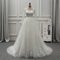 Elegante Ivoor Doorzichtige Trouwjurken 2019 A lijn Ronde Hals Lange Mouwen Ruglooze Appliques Kant Rhinestone Kralen Parel Rechter Trein Ruche