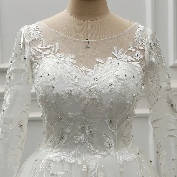 Élégant Ivoire Transparentes Robe De Mariée 2019 Princesse Encolure Dégagée Manches Longues Dos Nu Appliques En Dentelle Faux Diamant Perlage Perle Tribunal Train Volants