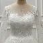 Élégant Ivoire Transparentes Robe De Mariée 2019 Princesse Encolure Dégagée Manches Longues Dos Nu Appliques En Dentelle Faux Diamant Perlage Perle Tribunal Train Volants