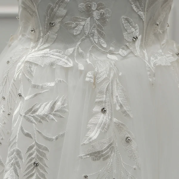 Élégant Ivoire Transparentes Robe De Mariée 2019 Princesse Encolure Dégagée Manches Longues Dos Nu Appliques En Dentelle Faux Diamant Perlage Perle Tribunal Train Volants