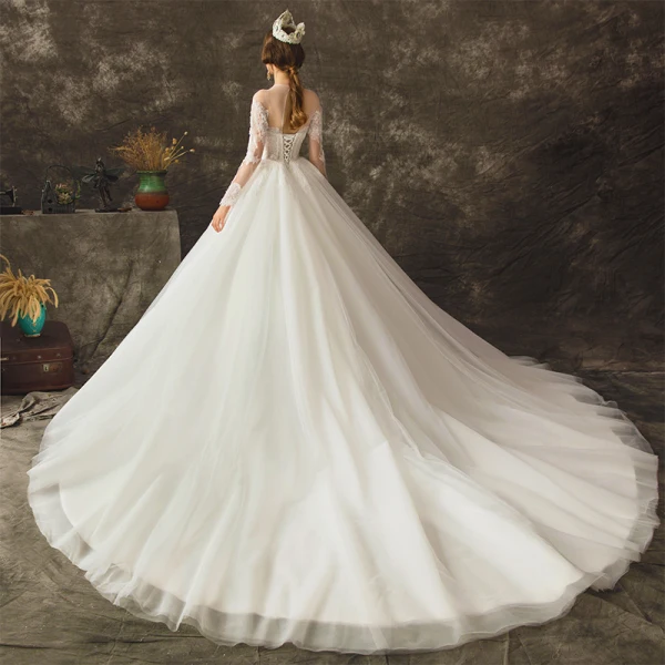 Charming Ivory See-through Wedding Dresses 2019 Ball Gown Scoop Neck Long Sleeve Backless Appliques Lace Beading Pearl Chapel Train Ruffle