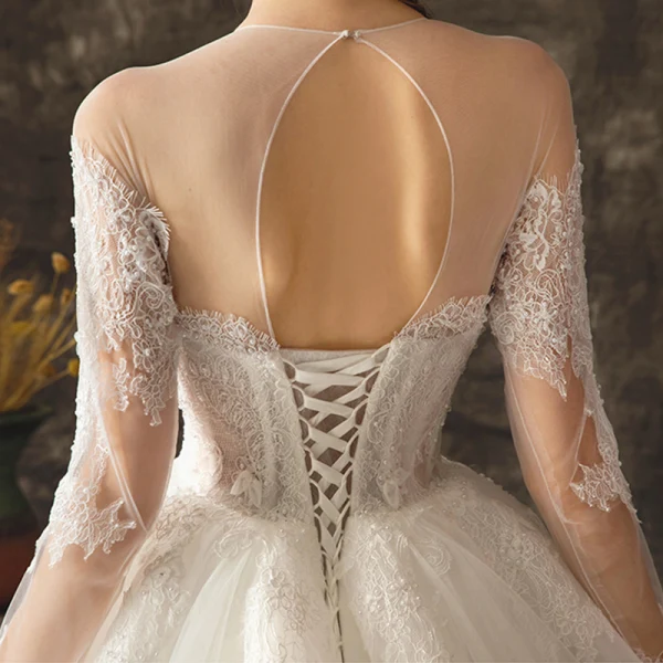 Charming Ivory See-through Wedding Dresses 2019 Ball Gown Scoop Neck Long Sleeve Backless Appliques Lace Beading Pearl Chapel Train Ruffle