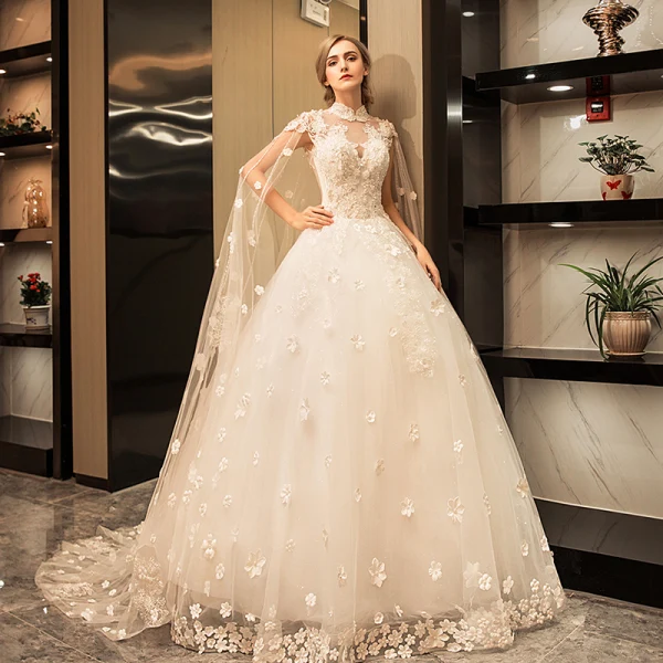 Vintage / Retro Sparkly Wedding Dresses 2017 White Lace Appliques Pearl Sequins High Neck Sleeveless Backless Cathedral Train Ball Gown