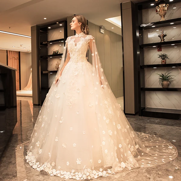 Vintage / Retro Sparkly Wedding Dresses 2017 White Lace Appliques Pearl Sequins High Neck Sleeveless Backless Cathedral Train Ball Gown