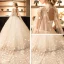Vintage / Retro Sparkly Wedding Dresses 2017 White Lace Appliques Pearl Sequins High Neck Sleeveless Backless Cathedral Train Ball Gown