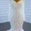 Luxe Blanche La Mariée Robe De Mariée 2021 Trompette / Sirène De l'épaule Manches Longues Dos Nu Perlage Paillettes Train De Balayage Volants