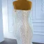 Luxe Blanche La Mariée Robe De Mariée 2021 Trompette / Sirène De l'épaule Manches Longues Dos Nu Perlage Paillettes Train De Balayage Volants